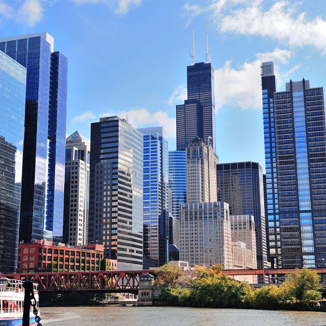 Chicago skyline with modern skyscrapers and riverfront view on a sunny day