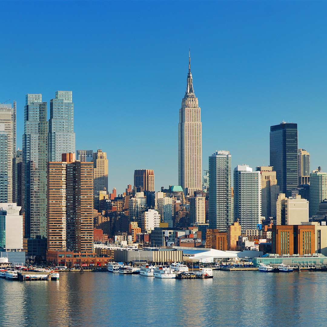 New York City skyline with waterfront buildings and the Empire State Building
