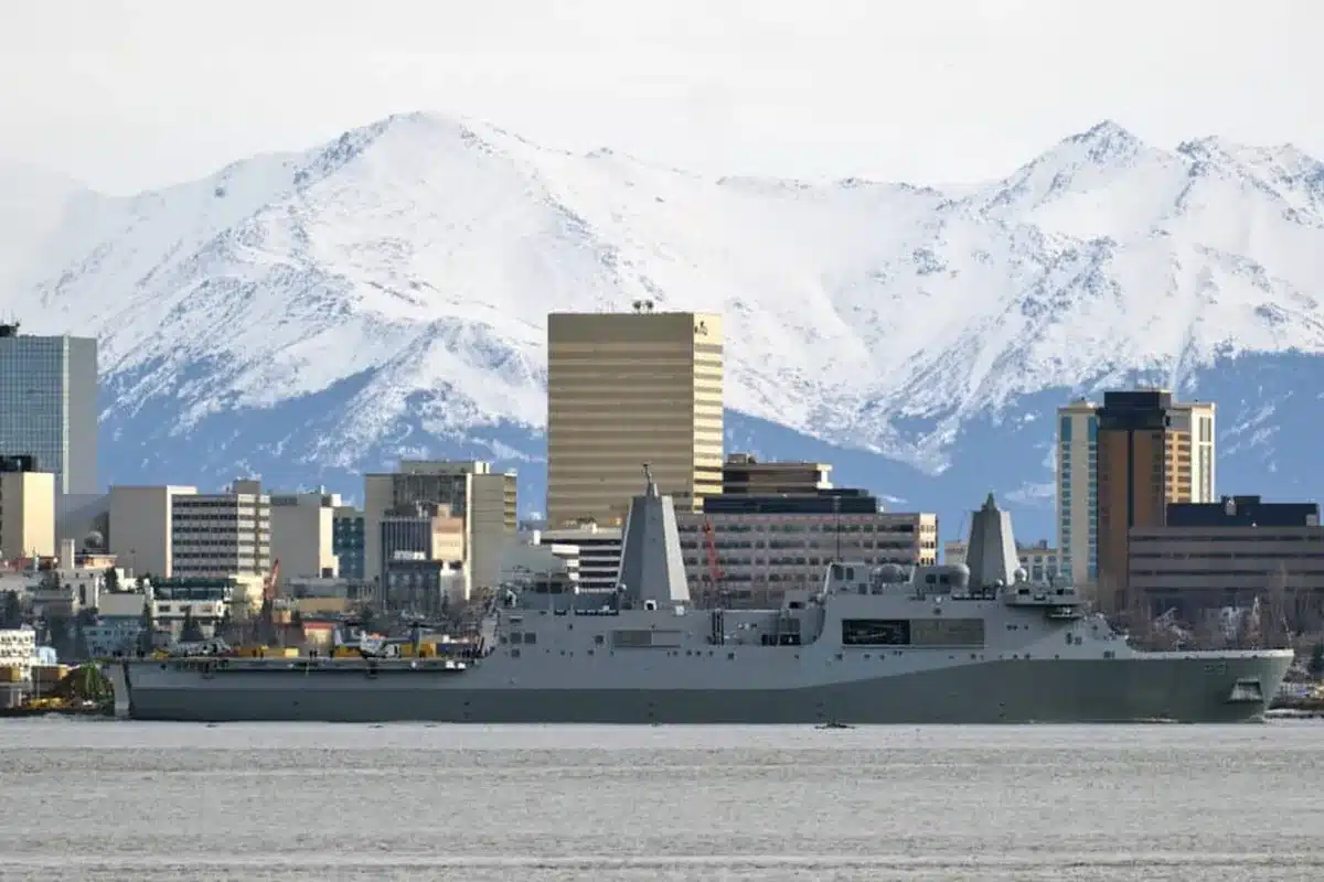 The uss anchorage in port at anchorage, alaska, below snowy mountains